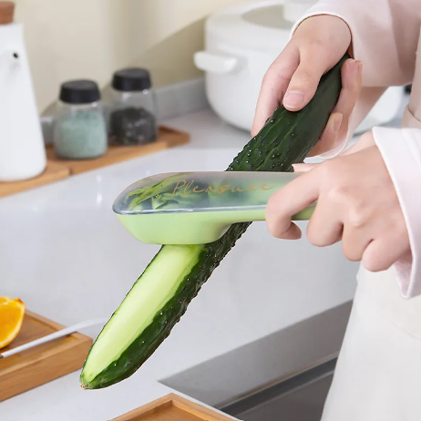 Veggie Peeler with Storage Tube